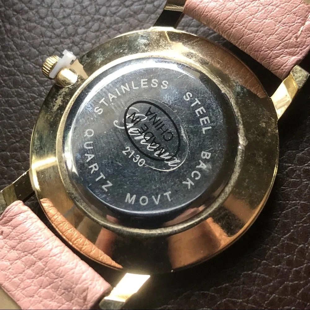 Ladies Geneva blush pink faux leather band watch